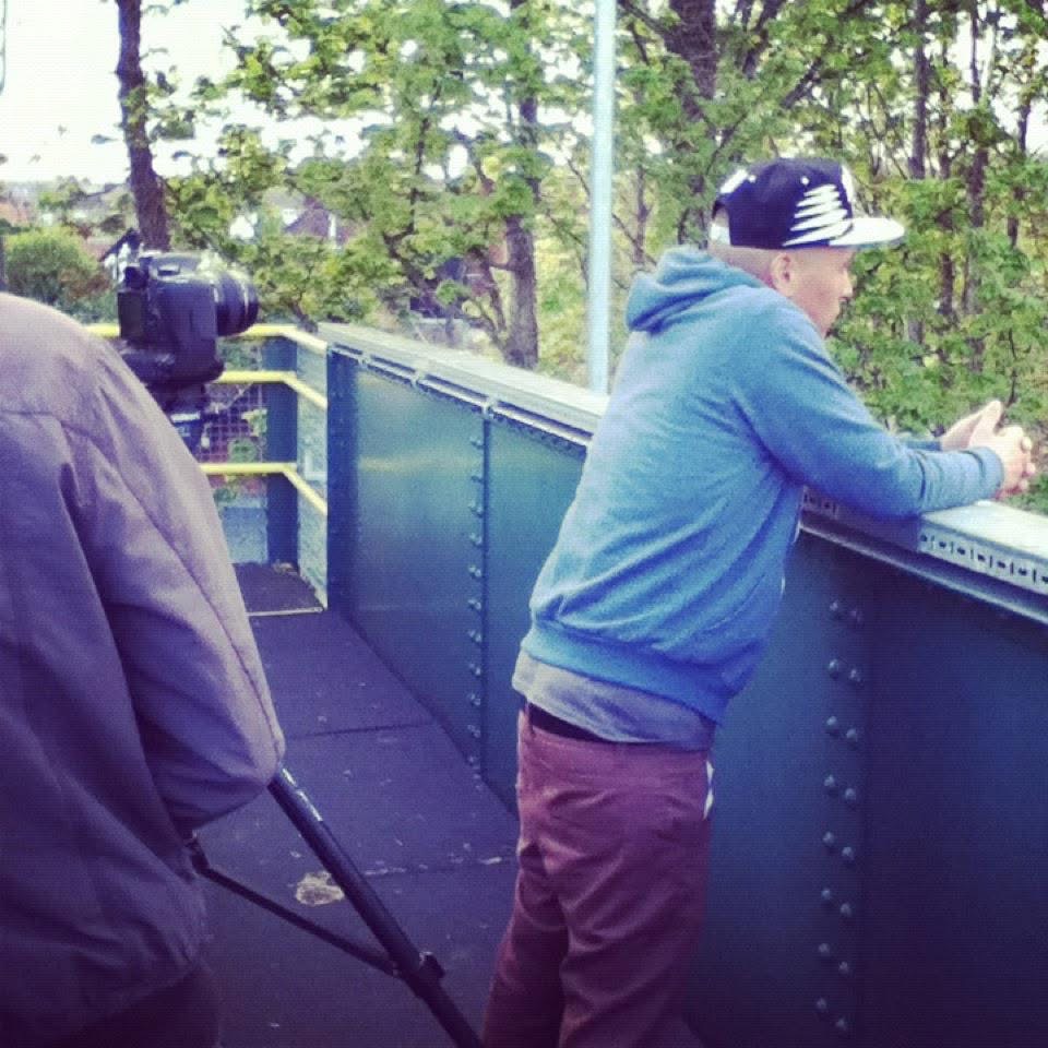 Isaiah Dreads on a video shoot with Agent.
