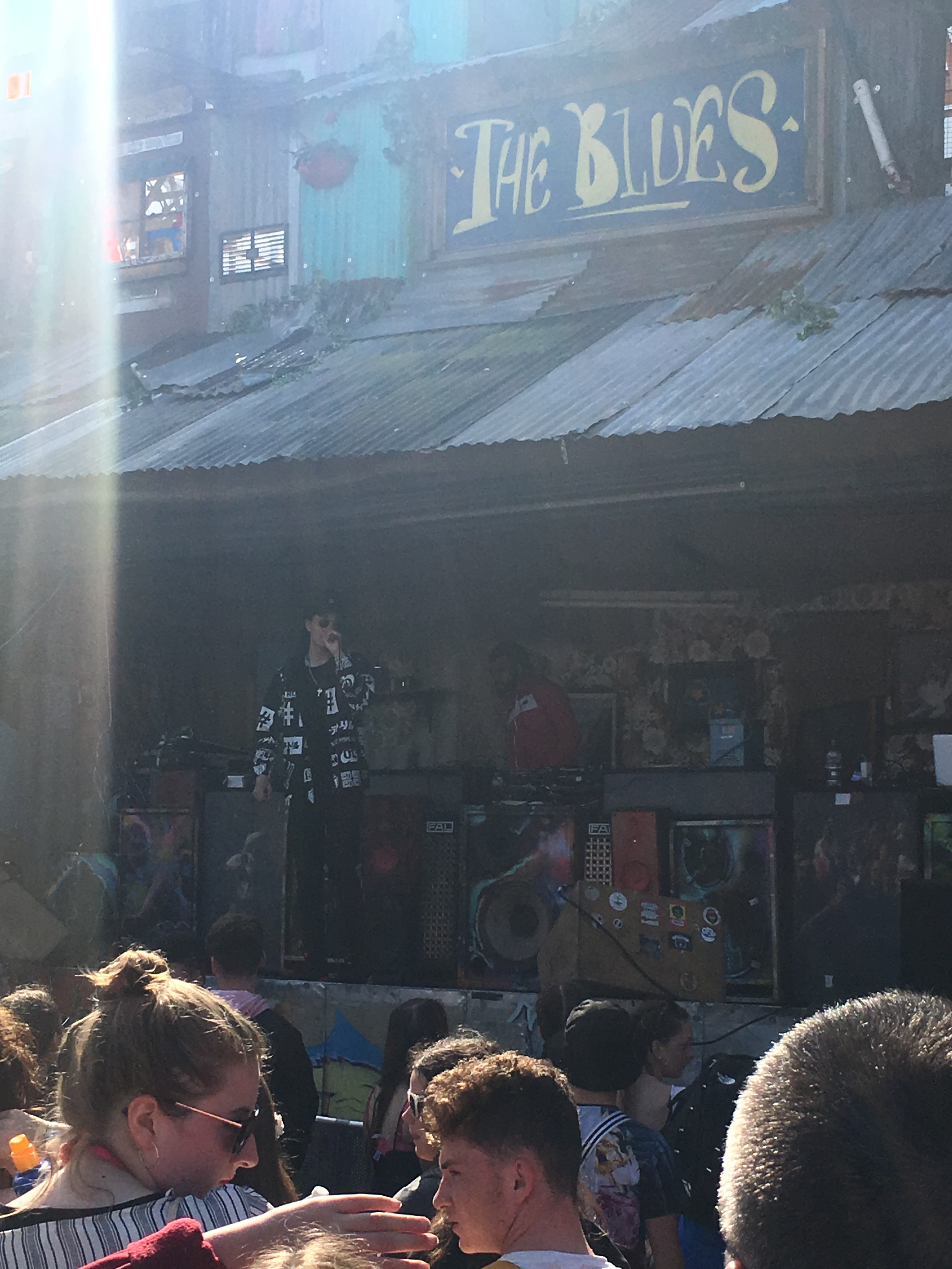 Isaiah Dreads performing at Glastonbury Festival on the Blues stage.