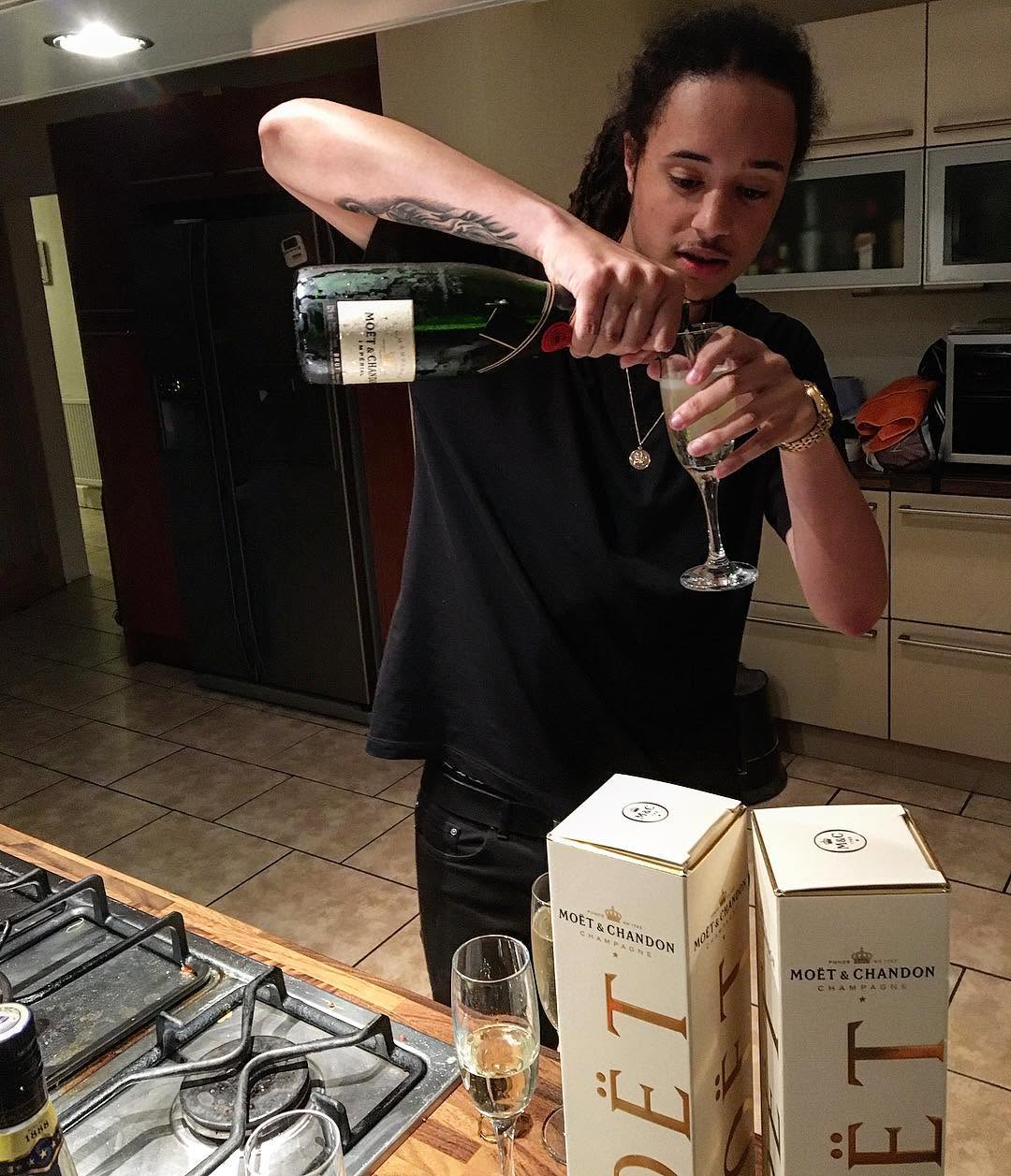 Isaiah Dreads celebrating after signing to Sony RCA.