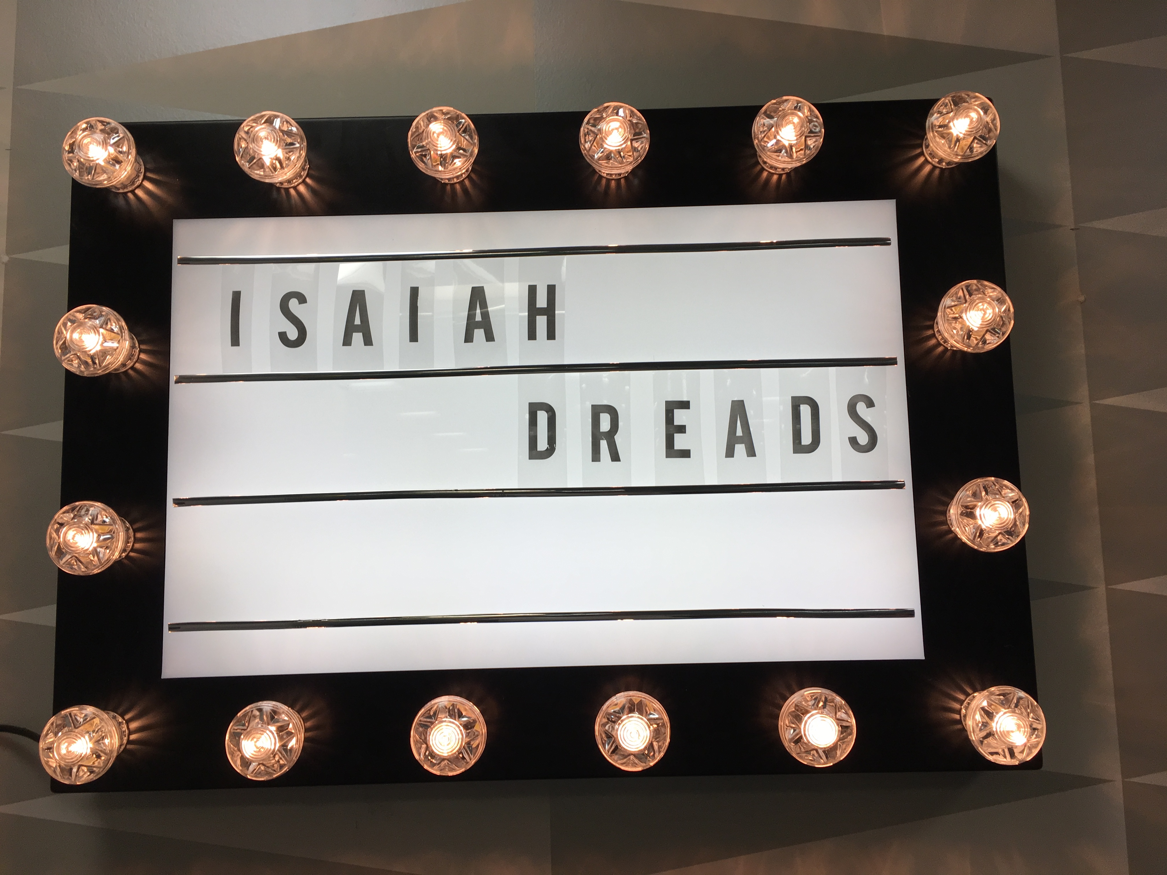 Sign for Isaiah Dreads' headline show.
