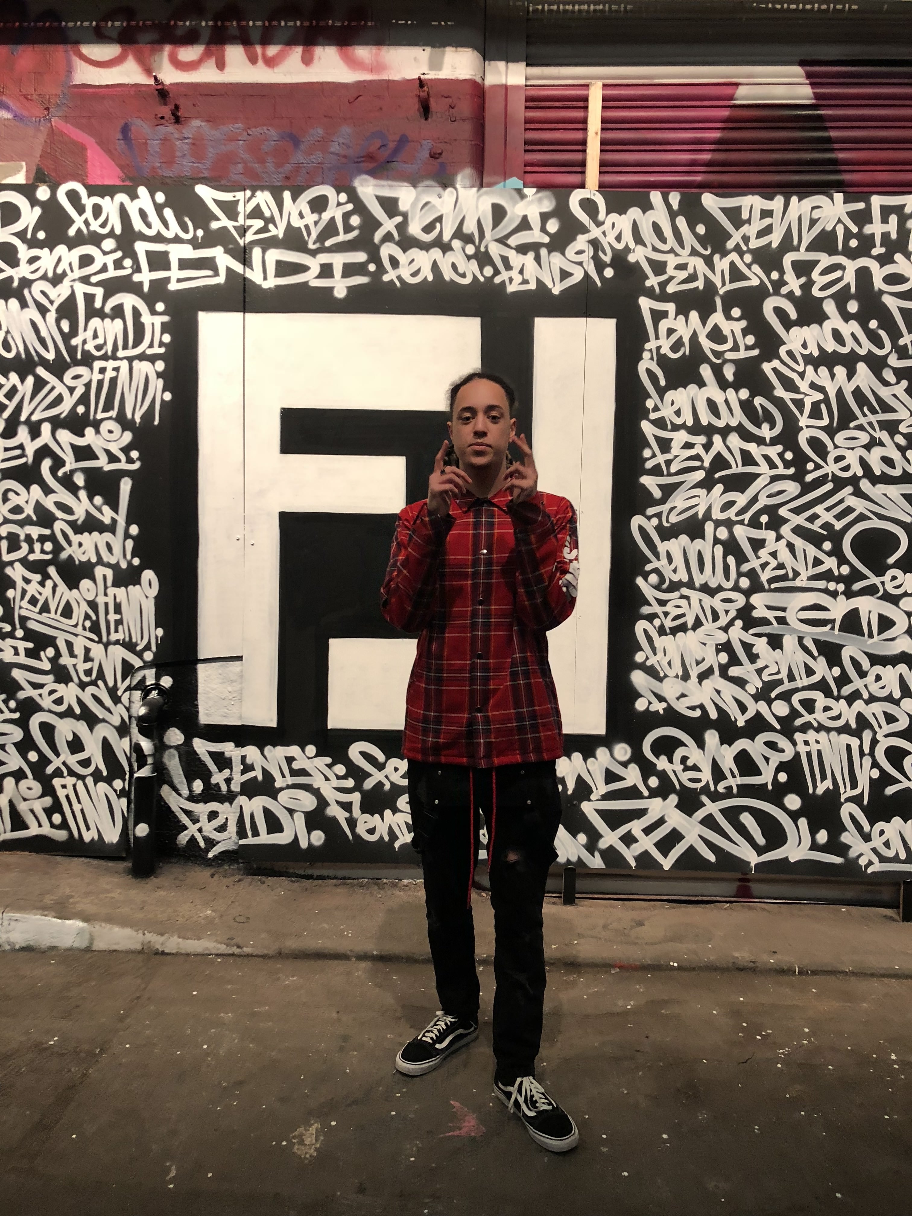 Isaiah Dreads at a Fendi party.