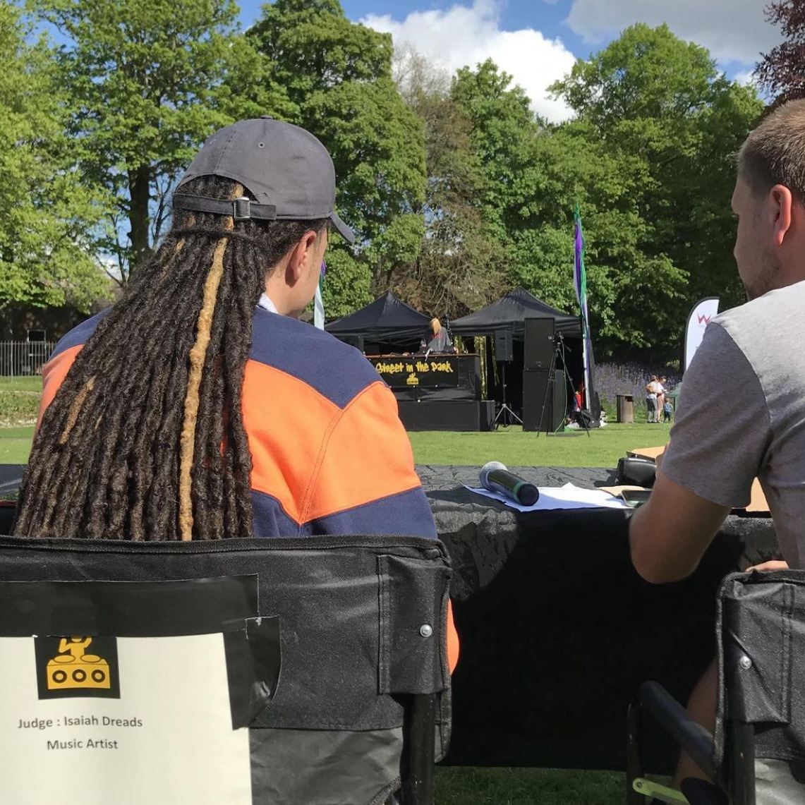 Isaiah Dreads judging the Street in the Park DJ competition in Dorchester, Dorset.