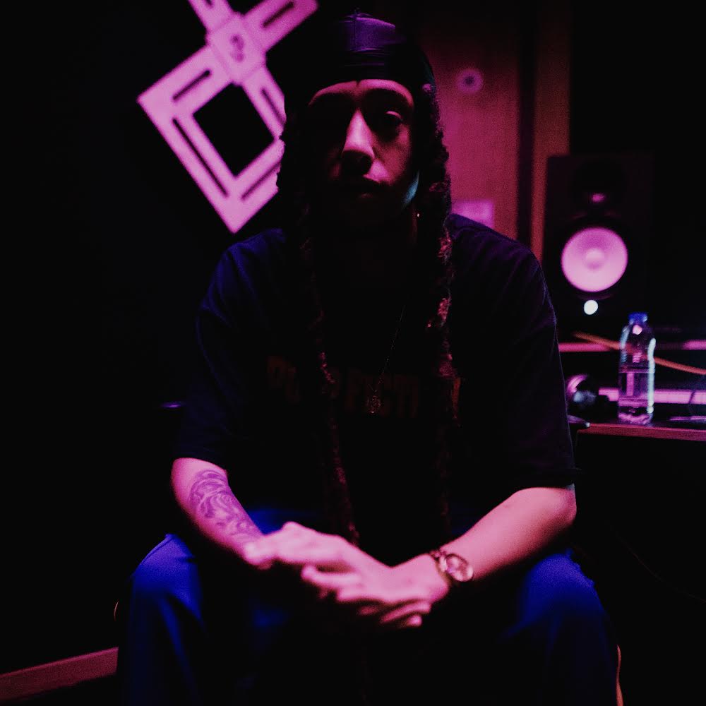 Isaiah Dreads working in the studio.